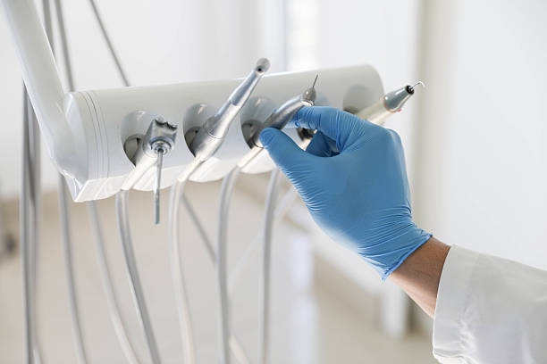 Professional Root Canal Treatment technician working in Beverly Hills, FL